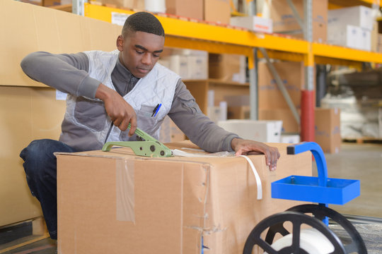 warehouse worker with boxes