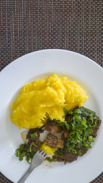 Potato pure Baroa with minced meat, garnished with chives. Healthy, appetizing and colorful food from the Brazilian Gastronomy in Sao Paulo State.