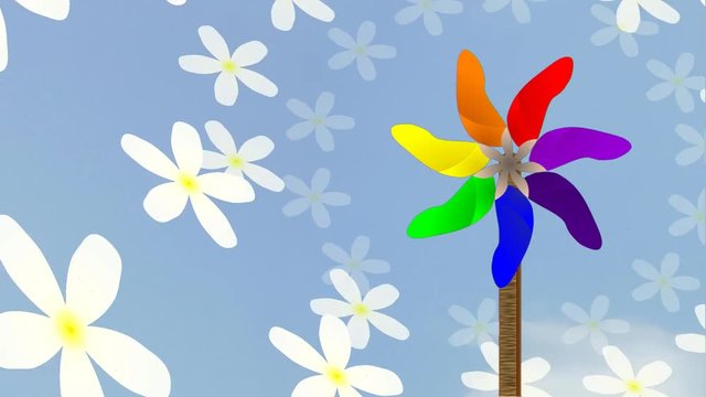 Spinning VIBGYOR pin wheel on wooden stick against cloudy blue sky background with appearing and expanding white yellow blossoms animation video