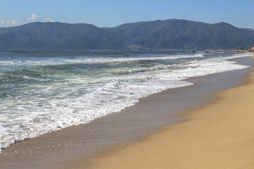 Landscape from the beach of camping Asprovalta against the silhouettes of mountain hills. Aegean Sea, Greece.