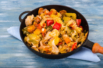 Mix of stewed vegetables in frying pan