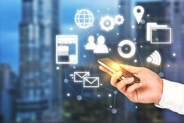 Man hand with smartphone internet icons network