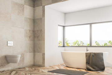 White tile bathroom corner, tub and sink