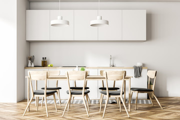 Modern white dining room and kitchen