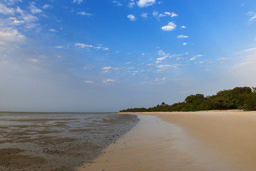 Deserted beach in the island of Orango at sunset, in Guinea Bissau. Orango is part of the Bijagos Archipelago; Concept for travel in Africa and summer vacations