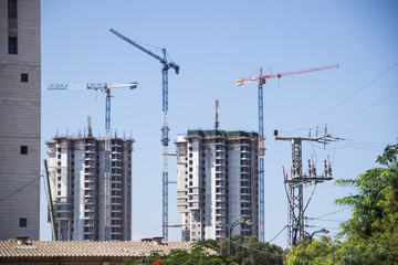 Construction of a skyscraper with a crane