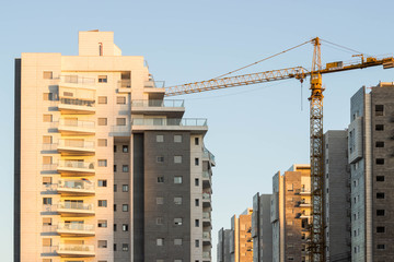 Construction of a skyscraper with a crane