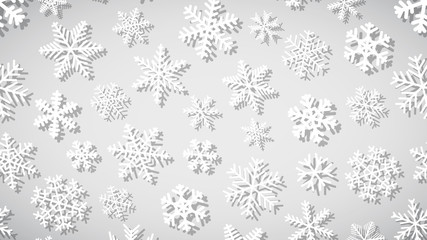 Christmas background of snowflakes of different shapes and sizes with shadows. White on gray.