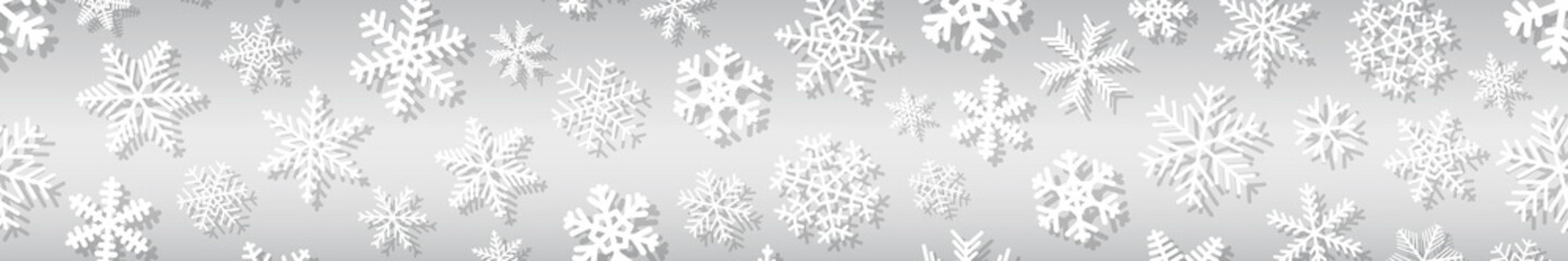 Christmas horizontal seamless banner of snowflakes of different shapes and sizes with shadows. White on gray.