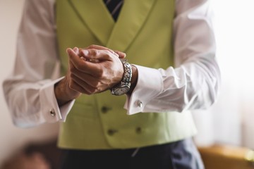 Men dressing on their wedding day