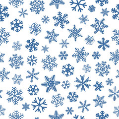 Christmas seamless pattern of snowflakes, blue on white background