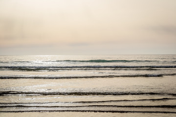 Tangier beach and waves and rocks