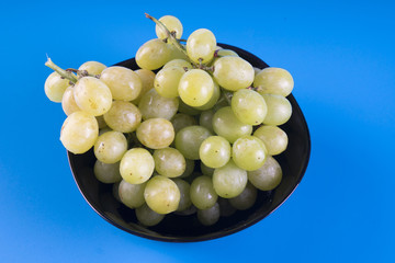 grapes in bowl isolated