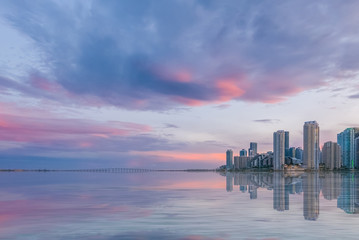 Miami at sunset, evening sky over the business city of USA