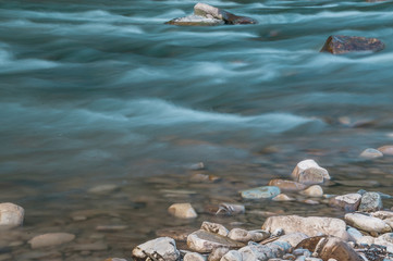 Obraz premium mountain river in the valley after the rain on a summer