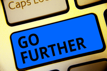 Writing note showing Go Further. Business photo showcasing To move to a greater distance or overcome your limitations Keyboard blue key Intention computer computing reflection document.