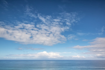 Aerial. Outdoor ocean white clouds poetic image.