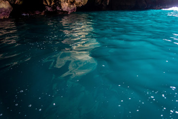 Fototapeta na wymiar Blue water in a cave