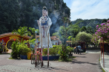 Guan Yin statue at Ling Sen Tong Cave Temple, Ipoh, Malaysia - Ling Sen Tong is a beautiful Taoist cave temple located at the foot of a limestone hill in Ipoh, Malaysia. © lcchew