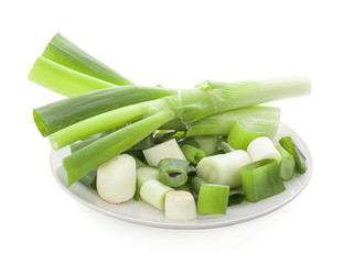 onions in plate on white background