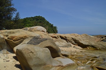 a big stone at the beach