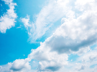 Naklejka na ściany i meble Summer time blue sky background with tiny cloud