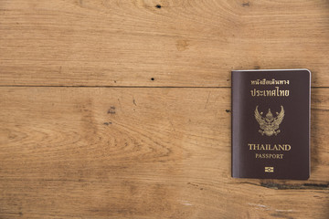 Thailand passport on wood
