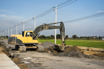 backhoe working on the road