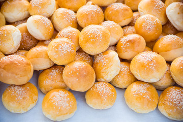 Round bread with sesame on table