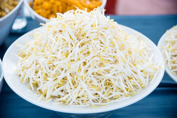 Bean sprout in big white plate on table