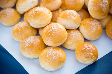 Round bread with sesame on table