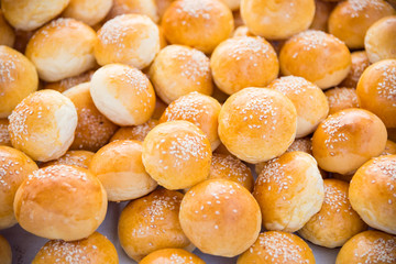 Round bread with sesame on table