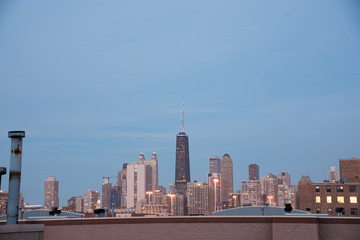 Fototapeta na wymiar Chicago skyline at dusk as seen from a rooftop.