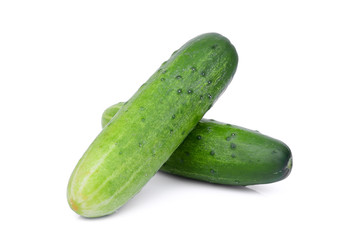 two whole cucumbers isolated on white background