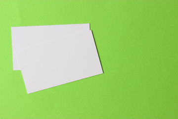 white business cards on a colored background.