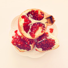 Rosh hashanah (jewish New Year holiday) concept. Pomegranate raditional symbol. Flat lay.