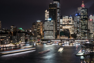 Night view of the Circular quay and the financial district skyline from the Sydney harbor bridge in Sydney in Australia largest city