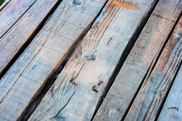 Obraz premium Old wooden boards with knots