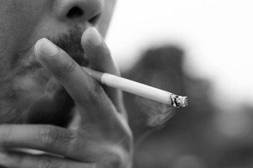 Man smokes a cigarette
