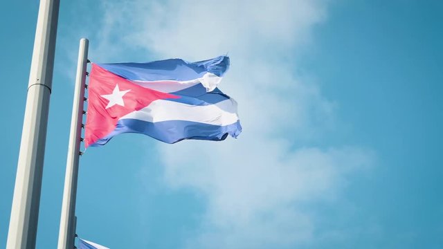 Cuba Waving Flag with Havana on background.