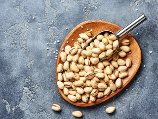 Salted Pistachios nuts. Top view of snacks.