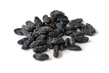 Heap of black raisins isolated on white background.