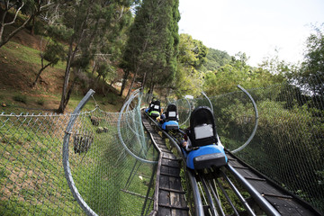 Rail downhill on a trolley to the Datanla waterfall in Vietnam