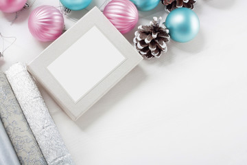Pink and blue Christmas balls with gift box and wrapping paper