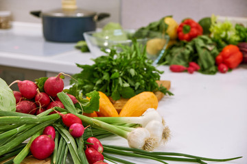 healthy foods are on the table in the kitchen.