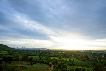 Obraz premium Landscape of cloudy, mountain and forest with sunset in the evening from top view.
