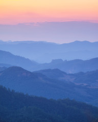 Layer soft mountain colorful at sunset