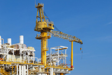 Crane construction on Oil and Rig platform for support heavy cargo. Transfer cargo or basket on work site, Heavy industry, heavy job on the oil and gas platform, Offshore operation on the platform.
.