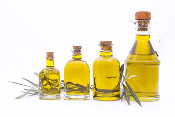 bottles of extra virgin olive oil isolated on white