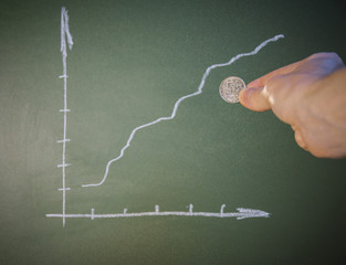 Chart with positve arrow and coin.
